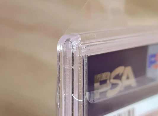Do PSA Slabs Protect Cards? What They Actually Protect - PrismGuard Pro